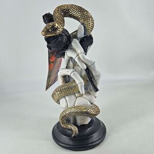 Christian Lacroix Halloween skeleton hand holding gold snake n rose figurine